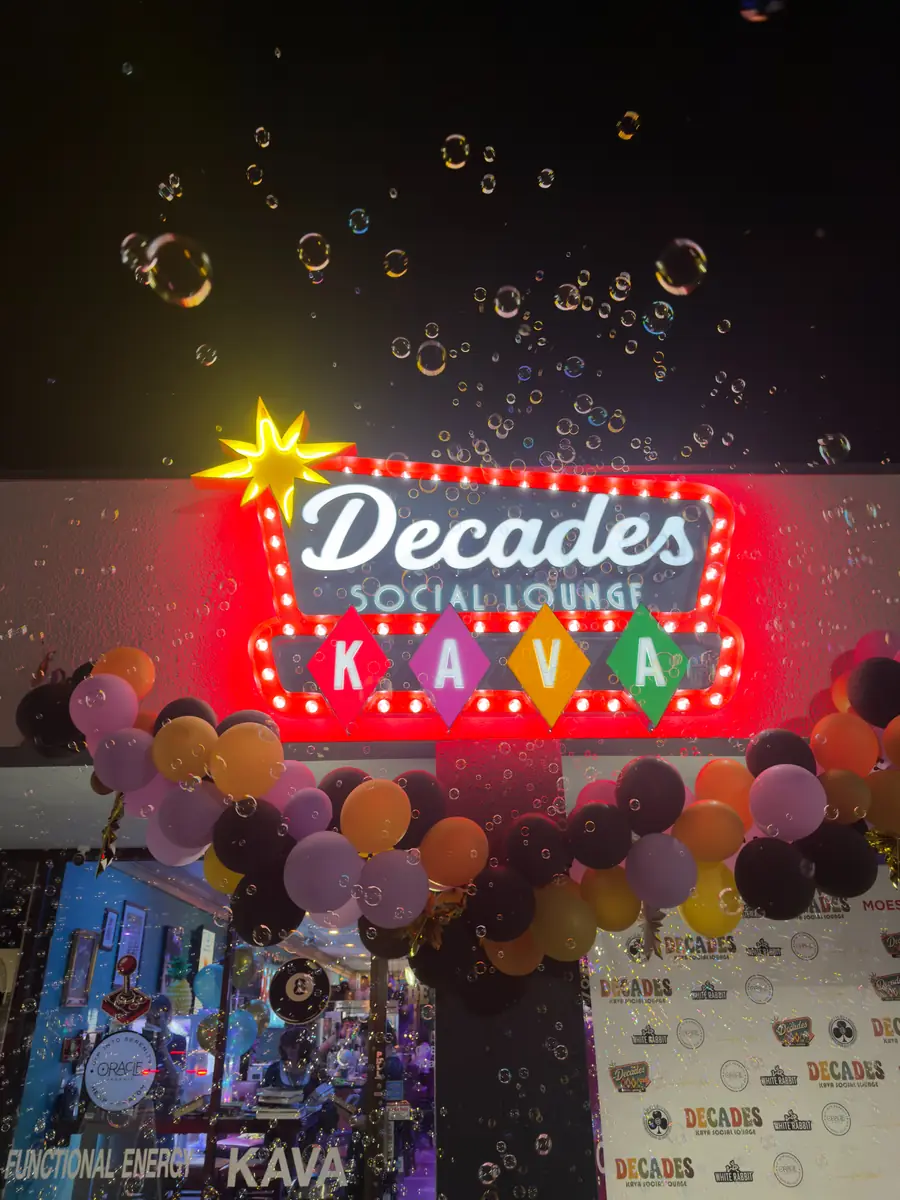 The Decades marquee sign glowing out front with bubbles