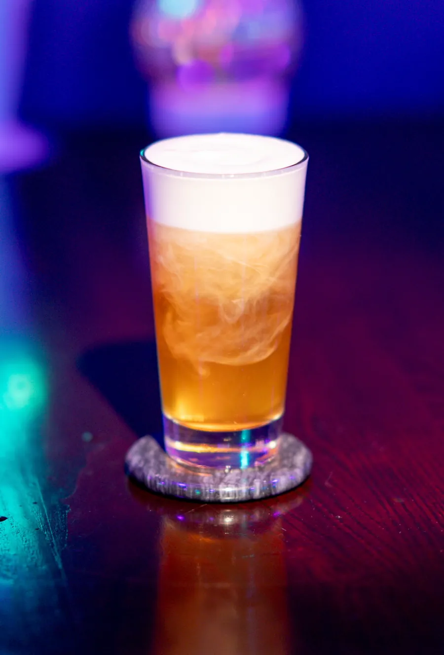 Butter Beer botanical mocktail with butterscotch foam at Decades Kava in Longwood, FL